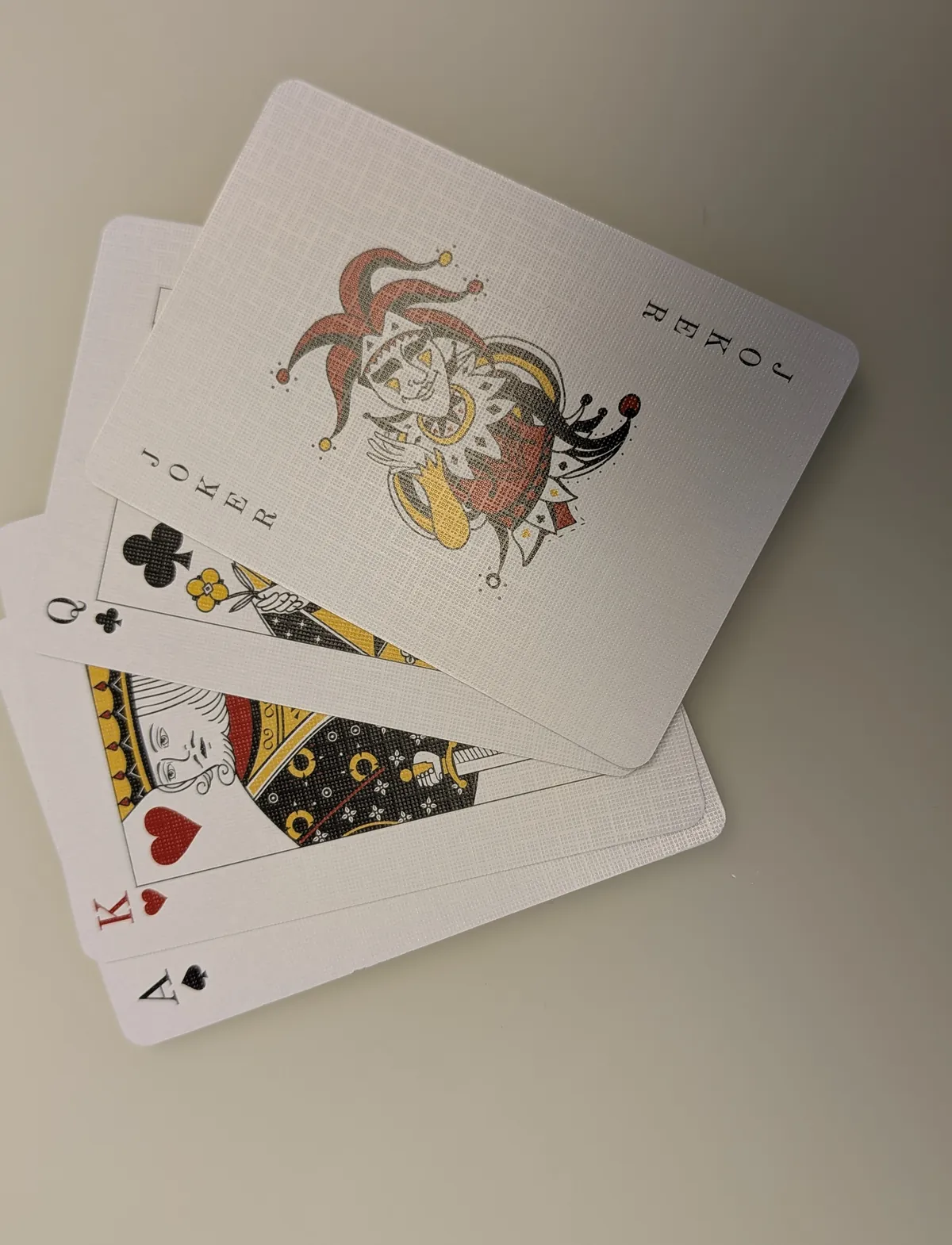 Cartes à jouer personnalisées en éventail, finition toilée, joker, dame et as